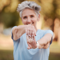 Image showing Senior woman, stretching arms and outdoor exercise for body care fitness, workout training or healthy retirement lifestyle. Elderly person, cardio performance and zen yoga endurance in nature park