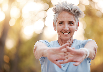 Image showing Happy, fitness or old woman stretching arms in nature for body wellness, training or outdoor exercise in Australia. Smile, portrait or elderly sports person exercising in warm up in forest in spring