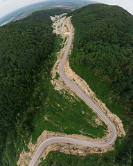 Image showing Aerial top vew of winding road in the mountains