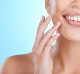 Image showing Beauty, face and skin, woman and skincare with hand for manicure, facial zoom and natural cosmetics, teeth and dental, cosmetic mockup. Healthy glow, wellness and teeth whitening with blue background