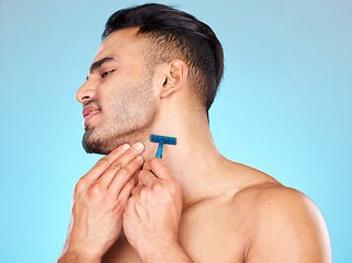 Image showing Man, shaving beard and facial skincare cleaning for beauty wellness, morning grooming or self care in studio. Face cleaning, cosmetics dermatology care and shave with razor for self care hygiene