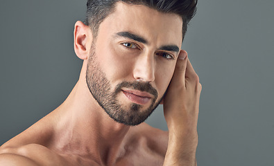 Image showing Man, face and skincare on gray studio background in healthcare wellness, Brazilian beard or collagen dermatology. Portrait, model headshot and facial hair growth on grey backdrop or grooming routine