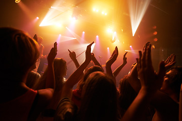 Image showing Music rock festival, concert or performance event with audience, crowd or people hands dancing with fans, youth and friends. Group of people at a techno, disco rave or night party club in celebration