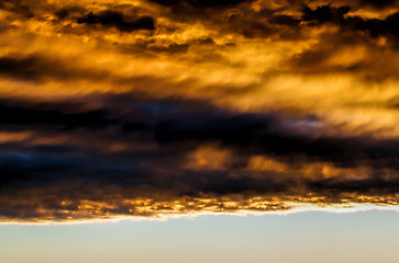 Image showing dark clouds and bright sunlit sky