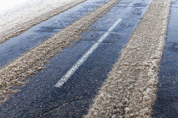 Image showing winter time on a narrow rural highway