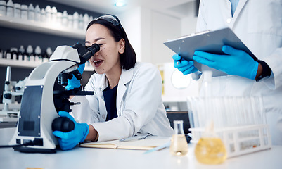 Image showing Microscope, scientist and woman with worker, research and medical cure in laboratory. Clipboard, researchers and employees analyzing results, innovation or check sample data for collaboration or talk