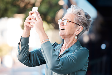 Image showing Phone, city and senior business with a woman typing a text message outdoor for communication or networking. Contact, email and 5g mobile technology with a mature female manager searching for signal