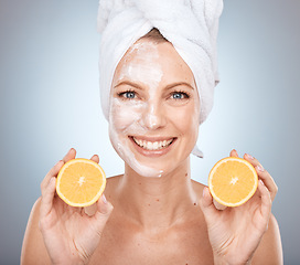 Image showing Portrait of woman, orange and skincare mask after shower with vitamin c for body cleaning, cosmetics and beauty, detox and wellness on studio background. Mature model with face mask of citrus fruits