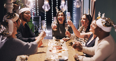 Image showing Christmas, party and friends toast with champagne at dinner, lunch and festival celebration together. Social event, cheers and men and women with alcohol enjoy, holiday, vacation and dinner party