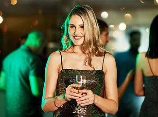 Image showing Party, event and woman with champagne at nightclub, having fun or drinking. Celebration, clubbing and happy female holding cocktail celebrating new year, partying or enjoying time at social gathering