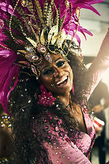 Image showing Portrait, brazil and carnival with a black woman dancer in stage costume to perform for tradition or celebration. Dance, festival and culture with a Brazilian female dancing alone at a music event