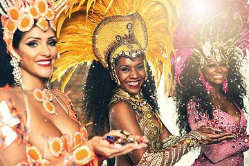 Image showing Dance, samba and portrait of women at event outdoor for culture, tradition and celebration. Happy, smile and people from Brazil dancing at traditional festival, concert or carnival in Rio de Janeiro.