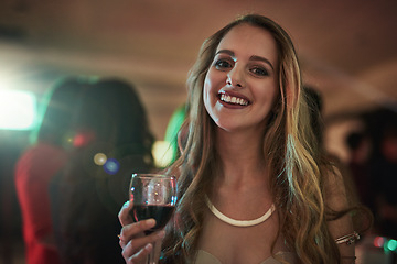 Image showing Party, drink and portrait of woman in nightclub having fun at rave, concert and social event with alcohol. Celebration, birthday and happy girl enjoying night with music, crowd and cocktail at disco