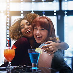 Image showing Women, hug and friends at club with drinks, having fun and bonding. Portrait, night and happy girls hugging, embrace or cuddle while enjoying quality time together with alcohol or cocktails at party.