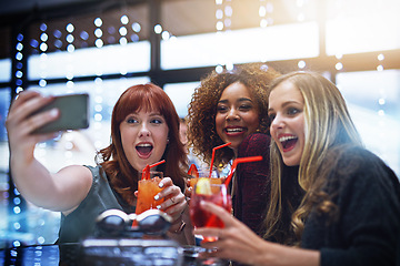 Image showing Women, friends and phone selfie at club with drinks, having fun or bonding. Night, celebration and group of girls taking a photo on mobile smartphone for happy memory, social media or profile picture