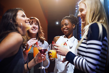 Image showing Club drinks, night and women at a party, happy hour and social celebration for happiness. Disco communication, diversity and friends at an event with cocktails at a nightclub with music and smile