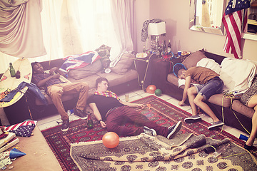 Image showing Party, drunk and hangover with man friends sleeping on a sofa in the living room of a home after celebration. Drinking, hungover and alcohol with a male group after a birthday or new year event