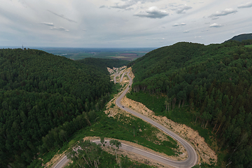 Image showing Aerial top vew of winding road in the mountains