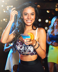 Image showing Woman, party and cocktail drink at nightclub, holiday celebration and new year portrait, happy ladies night and social. Celebrate, alcohol and drinking at club with happy hour and fruit cocktails