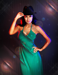 Image showing Woman, disco portrait and fashion dress by dark studio background for party, club or dancing in night. Smile, happy rock model or smile in nightclub, social or new year for event, lens flare or shine