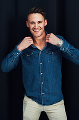 Image showing Man, fashion and stylish clothes on black background or studio mockup for clothing brand marketing, style vlog or Canada advertising. Portrait, smile and happy model with trendy, cool or relax shirt