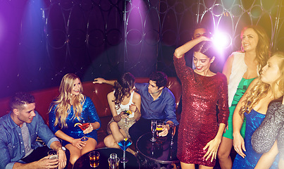 Image showing Party, friends group and happy in nightclub together for new years celebration, birthday party or dancing at club event. Disco dance, group of people and celebrate happiness energy with cocktails