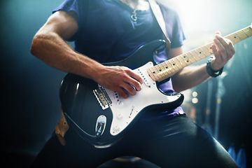 Image showing Guitar, man and performance at night, party and stage concert for punk, rock and heavy metal music festival. Electric guitarist, hands and musician, artist and band at live event, show and nightclub