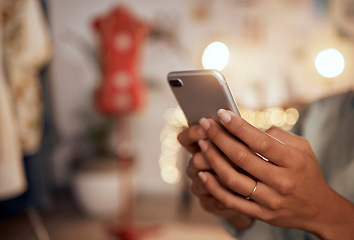 Image showing Hand, phone and woman using wifi to browse the internet for online shopping or e-commerce closeup. Zoom, hands and female scrolling social media for meme or media content on a mobile app