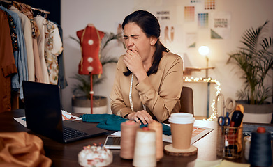 Image showing Fashion, laptop and design woman tired after overtime on creative work, startup small business or luxury clothes. Fatigue, yawn and designer girl with burnout from working at night in studio workshop