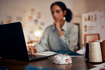 Image showing Business woman, laptop and thinking in fashion design, interior or tailor working on digital marketing at home. Female designer in fashion, sewing or idea contemplating for online small business