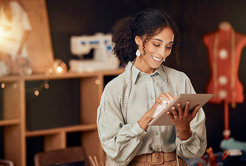 Image showing Black woman, fashion designer and tablet for planning, internet and web ideas in textile studio. Happy tailor, digital technology and manufacturing startup, small business owner and creative workshop