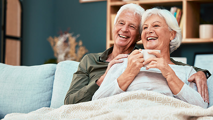 Image showing Love, senior couple relax on sofa drinking coffee and watching comedy movie on television. Retirement, old man and woman on couch in living room watching tv and smile in affection in home together.