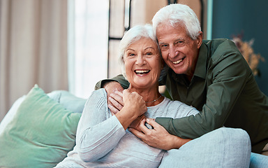 Image showing Portrait, hug and senior couple in living room in home, smiling and bonding. Love, retirement and smile of happy elderly man and woman on sofa, embrace and enjoying quality time together in house.