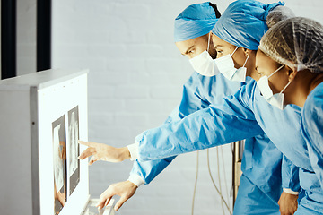 Image showing Surgery, operation and doctors check x ray with team of surgeons in preparation in emergency room. Healthcare, teamwork and medical workers analyze anatomy, body scan and screen results of patient