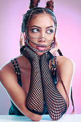 Image showing Model, bdsm and sexy clothes with leather, grunge fashion or edgy makeup, jewelry and erotic aesthetic on pink background. Face of girl with chain mask, creative wear and rock cosmetics in studio