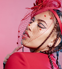 Image showing Fashion, punk and woman with makeup, cosmetics and accessories on a pink background in studio for rock, designer and creative beauty. Face of model for art, goth and eyeliner style with red net