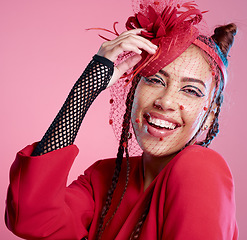 Image showing Portrait, style and woman with punk fashion feeling cheerful on a pink studio background. Fascinator, edgy and happy fashionable female with cool, creative cosmetics and makeup or beauty