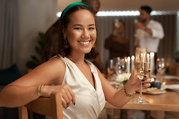 Image showing Restaurant, celebration and portrait of woman with champagne on birthday, new years and party. Dinner party, social event and happy girl with friends on holiday, vacation and Christmas party