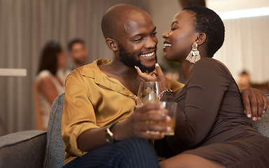 Image showing Love, event or couple of friends at a party in celebration of new years drinking wine or whiskey on holiday. Romance, black woman and black man talking, embrace or bonding on a relaxing romantic date