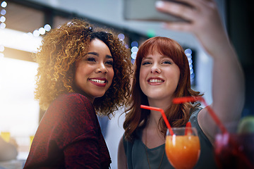 Image showing Phone, selfie and friends with club cocktail for happy hour, wellness and bonding. Interracial, women and friendship gathering with smartphone photograph and alcohol drinks with smile.