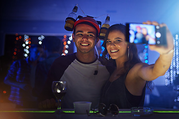 Image showing Friends, night club and smile for phone selfie, celebration or social event at the night party. Happy man and woman smiling for photo moments celebrating fun vibes together with mobile smartphone