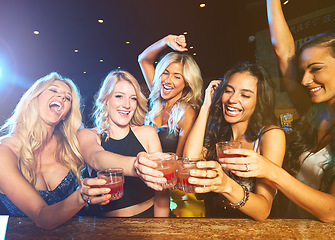 Image showing Friends, party in nightclub with cocktail and toast drink, fun and happiness with women at new year celebration. Night, excited with alcohol cocktails and cheers with energy, dance and drinks.