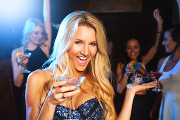 Image showing Party, alcohol and woman at nightclub for dancing, drinks and celebration of birthday, happy hour or new years with cocktail while excited at night. Happy female model with energy, fashion and smile