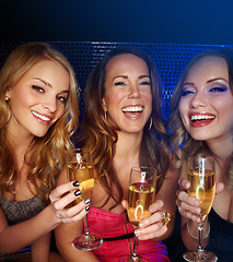 Image showing Champagne, women and friends smile in portrait in nightclub, new year party celebration and holiday happy hour. Happy people with alcohol drinks, celebrate and get drunk with social event and club.