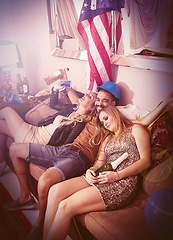 Image showing Drunk, happy birthday or friends sleeping in a party on house sofa with a hangover from beer or alcohol. Happy man, tired women or crazy people nap on couch at fun new year celebration in Texas, USA