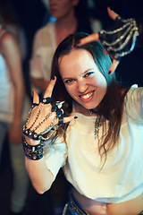 Image showing Woman at concert, fan with rock hands portrait at music festival, fun and new year social event, music and punk fashion gloves. Rock music, live and entertainment at show for Florida festival.