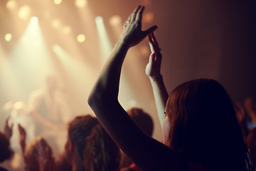 Image showing Music festival, audience or woman dance in crowd for disco, celebration or freedom with energy, club event or party. Concert or girl for dance with hands for support, celebrate new year or birthday