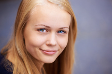 Image showing Smile portrait and happy girl face from Ireland with teen feeling relax and calm. Young teenager alone with youth skin glow and natural beauty smiling with healthy blond hair and isolated