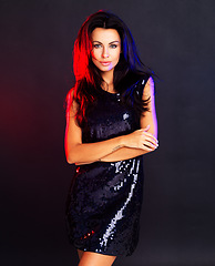 Image showing Portrait, beauty and woman dress for party, power or confident on black studio background. New year, young female and evening gown with attitude, elegant and proud lady ready for night out or glamour