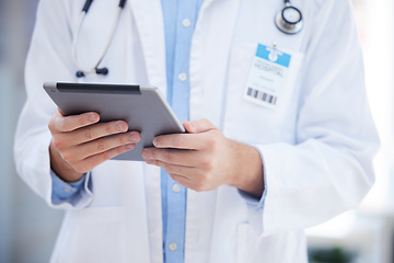 Image showing Healthcare, technology and hands of doctor with tablet online to review patient report, results and diagnosis. Medical worker with digital tech for insurance in hospital, clinic or health facility